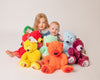 Children with their soft plush teddy bear. The Mood Bears. Promoting positive mental health in children and adults. Encouraging individuals to talk about how they are feeling in a fun way. Each bear has a worldwide recognised emoji embroided on their paw which makes it easy to associate with how you are feeling. These are more than a plush toy. They are a means to communication.